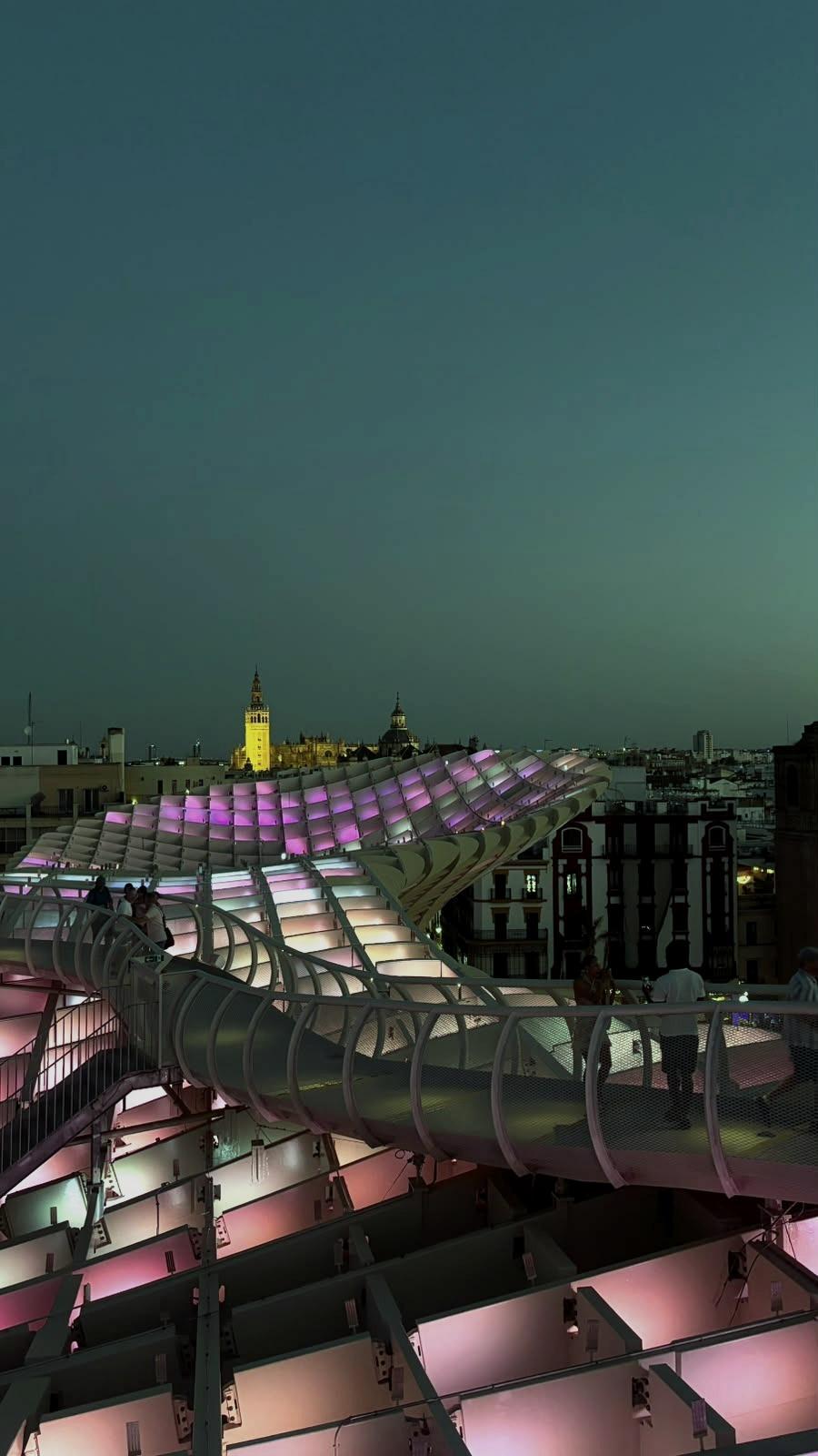The Setas de Sevilla lit up at dusk.